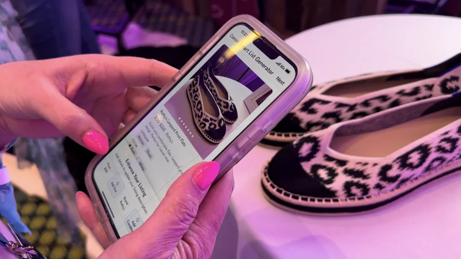 A seller trying Smart List AI on a pair of leopard-print flats at the booth