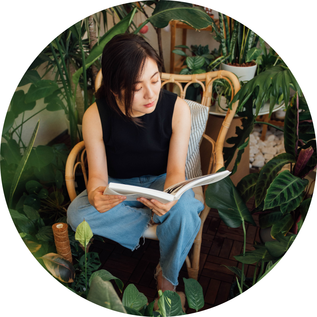Xinyi — reading among houseplants